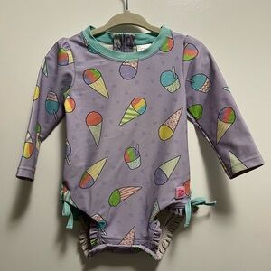RuffleButts Baby Girl Snow Cones Long Sleeve One Piece Rash Guard 12-18 Months